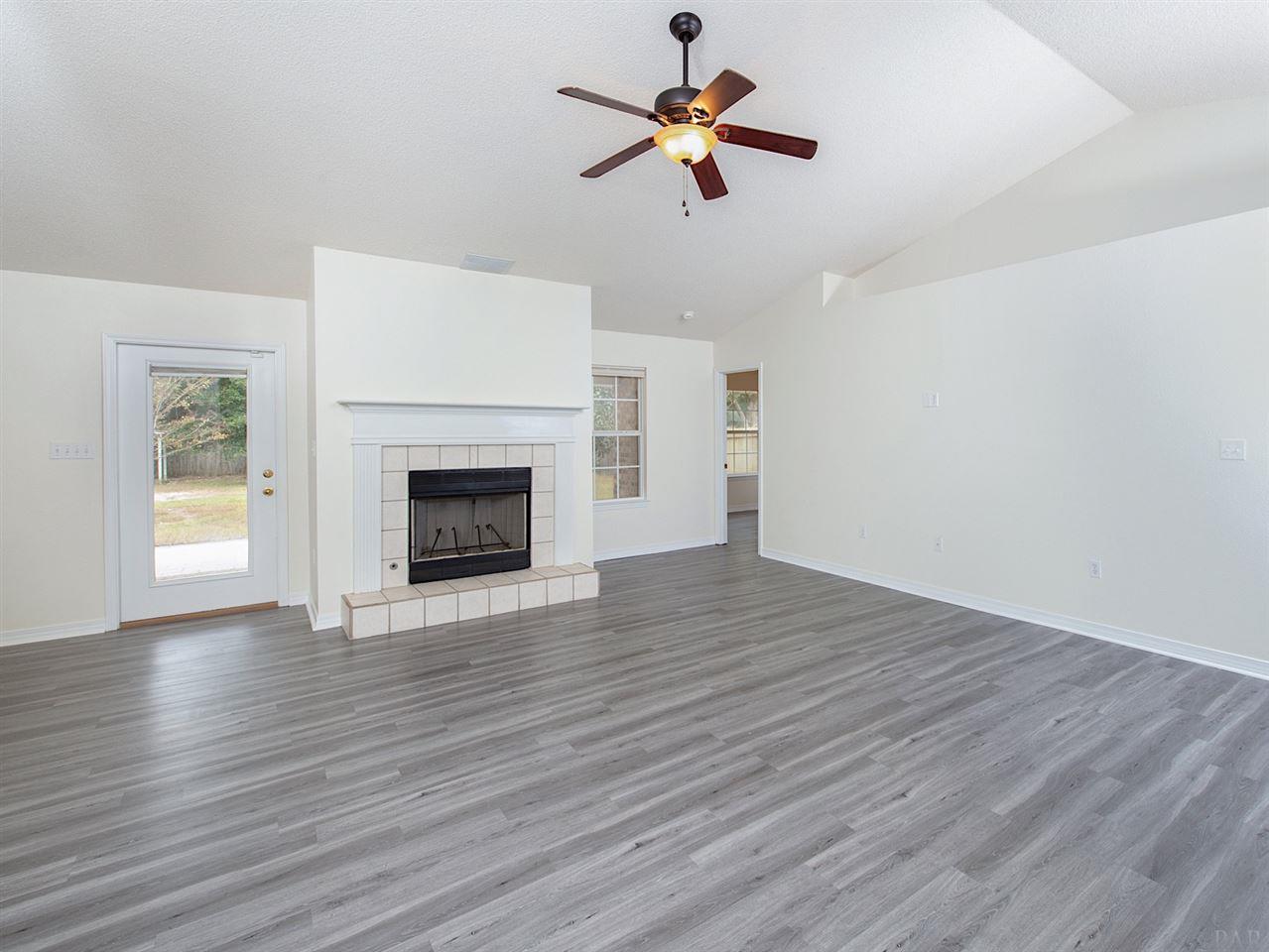 6852 Da Lisa Road Milton, FL 32583 - Photo 7 of 35 With the same flooring throughout home....