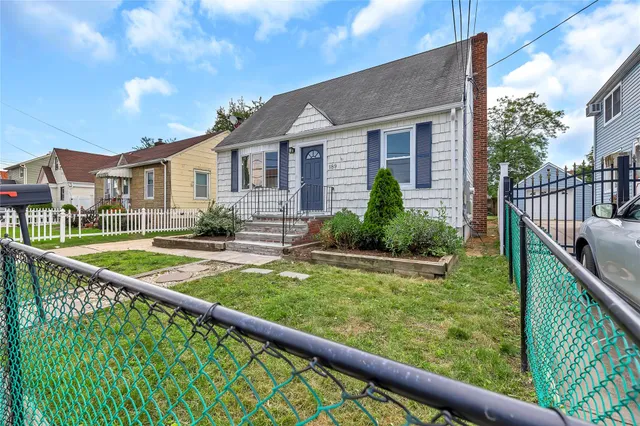 a picture of a bench in front of a door