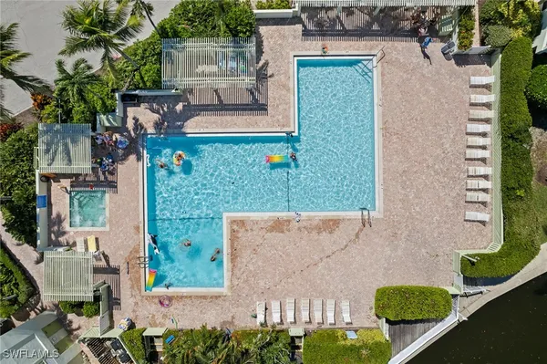 an aerial view of a house with a garden