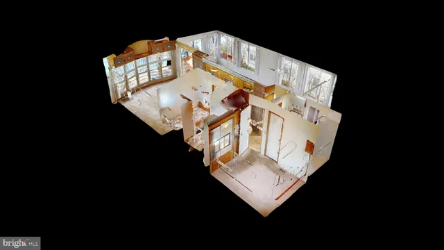 a view of a house with a patio and a yard