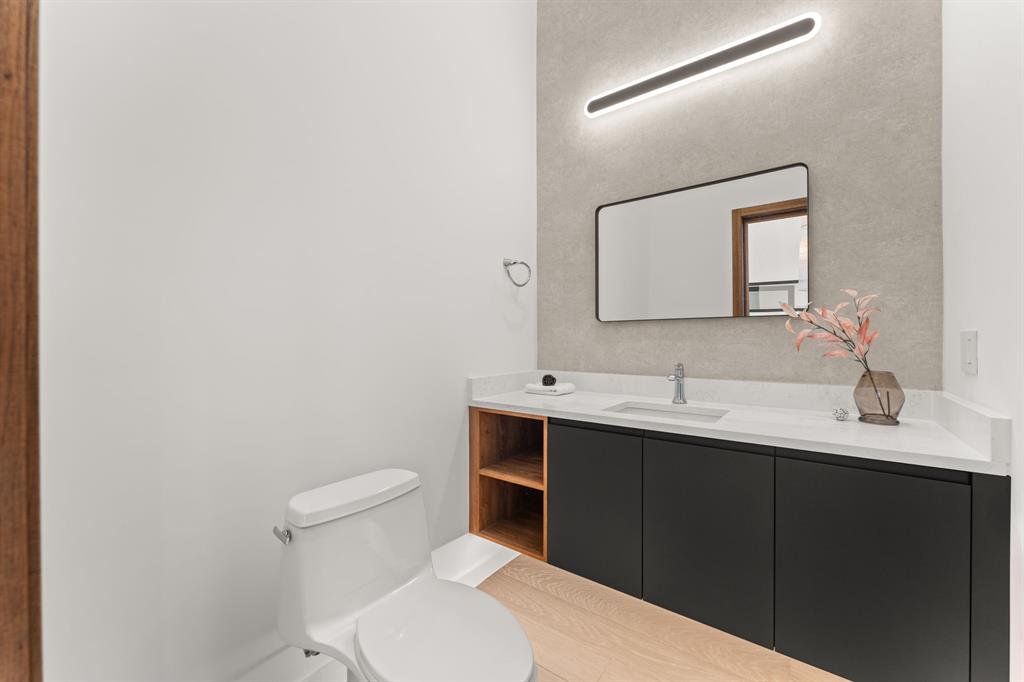 2714 Lakehurst Road Spicewood, TX 78669 - Photo 20 of 37 Half bathroom featuring vanity and toilet