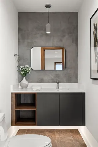 a white bath tub sitting in a bathroom