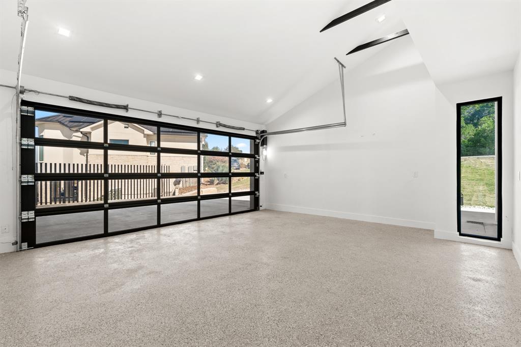 2714 Lakehurst Road Spicewood, TX 78669 - Photo 33 of 37 Garage with baseboards