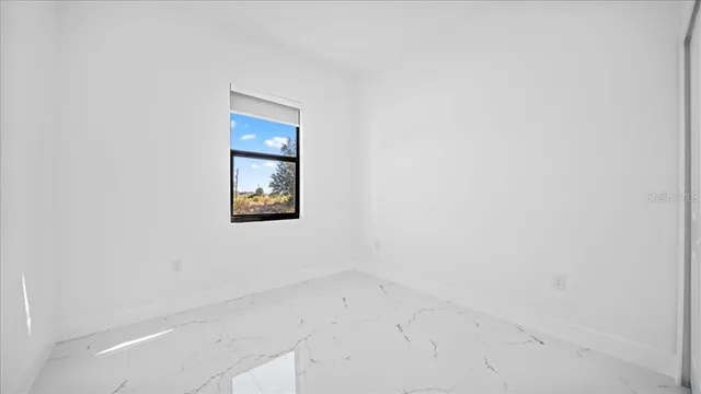 an empty room with a window