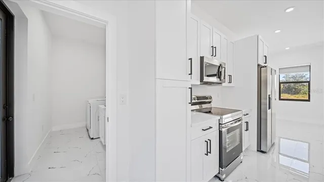 a bathroom with a sink and mirror