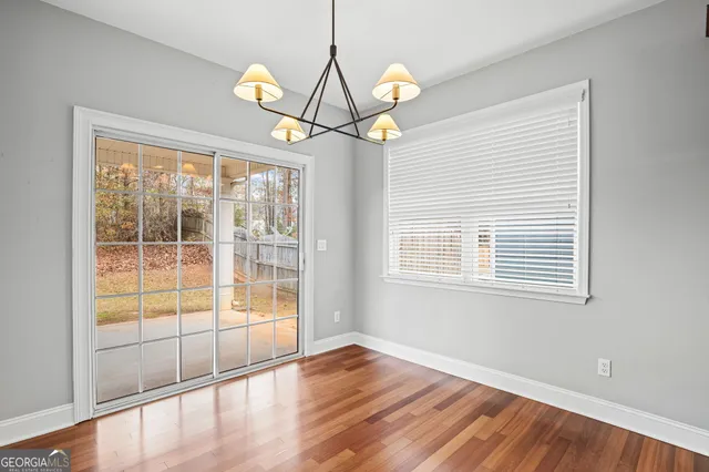 a bedroom with a bed and dresser