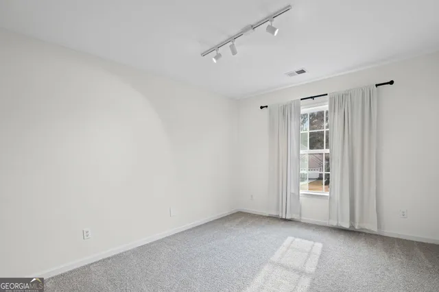 a view of a lake with a big yard