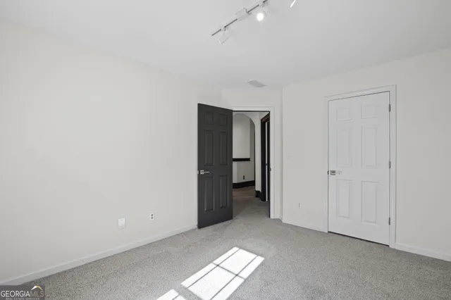 a view of a two chairs on the roof deck