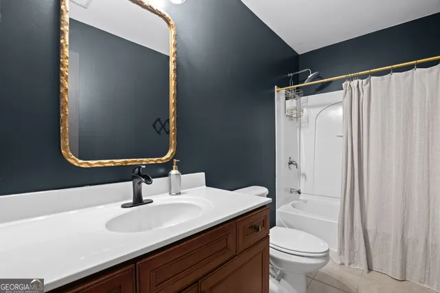 an aerial view of a house with a garden