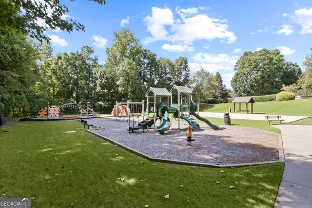 a view of a yard with an outdoor space