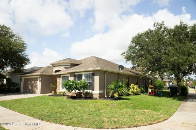 a view of a house with a garden