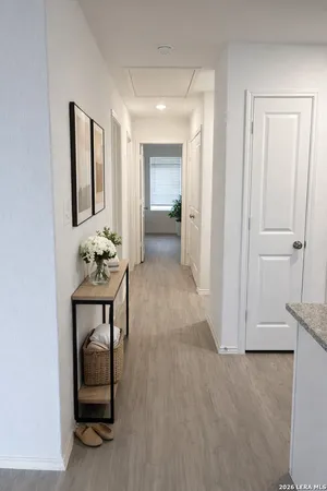a view of livingroom with furniture and mirror