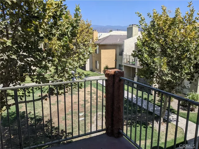 a view of a balcony with an outdoor space