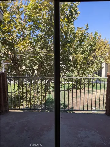 a view of backyard with green space