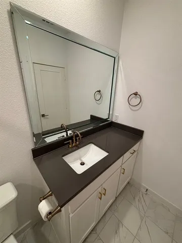 a bathroom with a toilet and a bathtub
