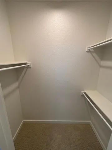 a view of small space with racks on the wall