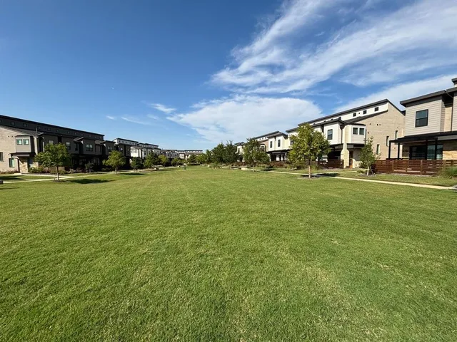 a big room with swimming pool in front of it
