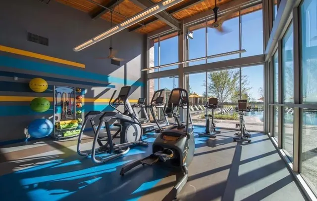 a view of a room with gym equipment