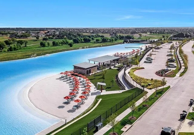 an aerial view of a swimming pool patio and mountain view