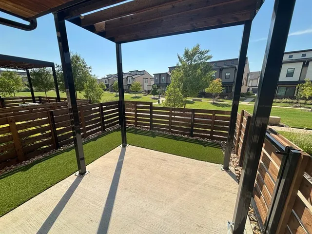 a view of a porch with wooden floor