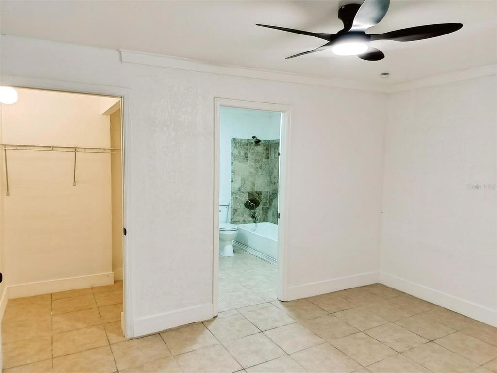 9901 Grace Drive Port Richey, FL 34668 - Photo 13 of 35 an empty room with a empty space and windows