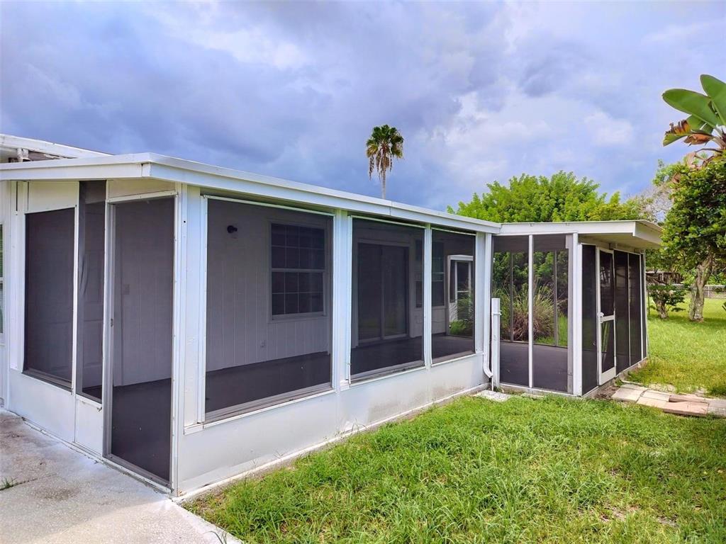 9901 Grace Drive Port Richey, FL 34668 - Photo 19 of 35 a view of a house with garden