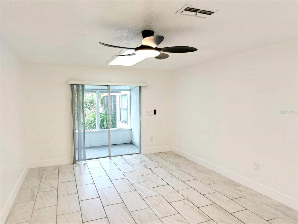 9901 Grace Drive Port Richey, FL 34668 - Photo 25 of 35 a view of an empty room and window