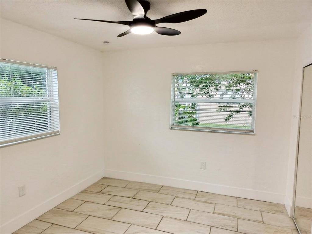 9901 Grace Drive Port Richey, FL 34668 - Photo 27 of 35 a view of an empty room with a window