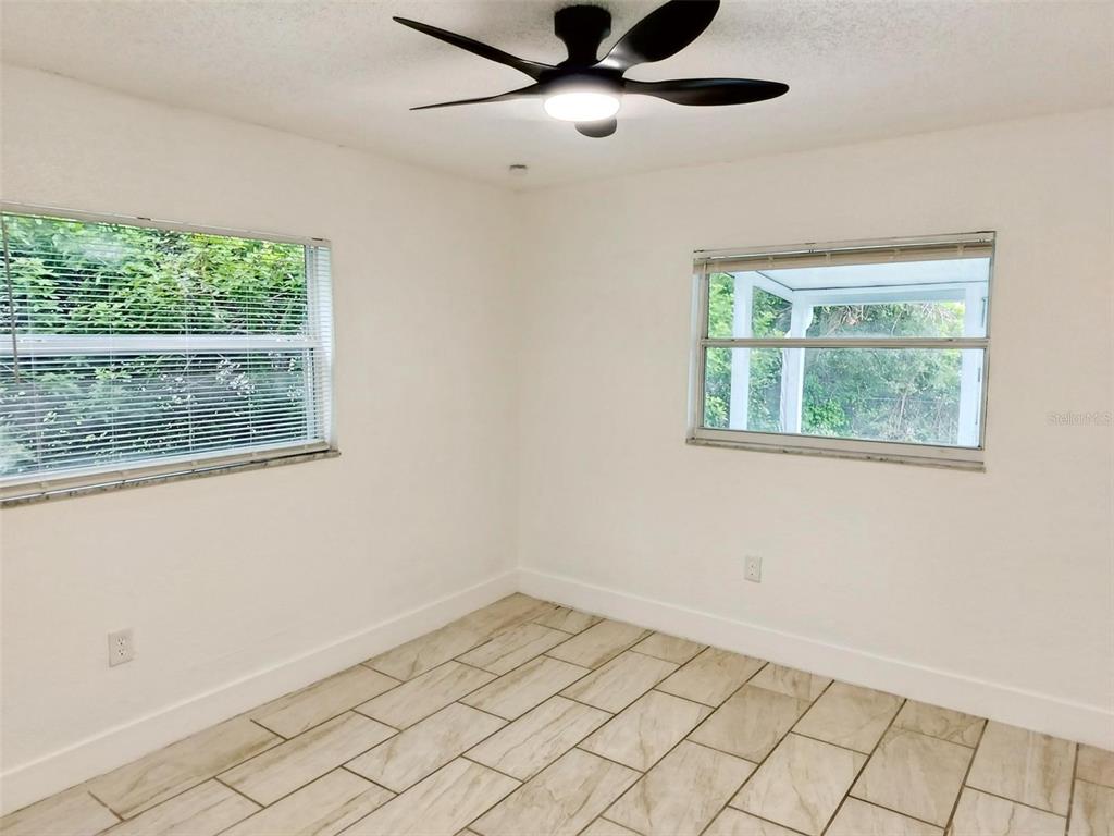 9901 Grace Drive Port Richey, FL 34668 - Photo 29 of 35 a view of an empty room and window