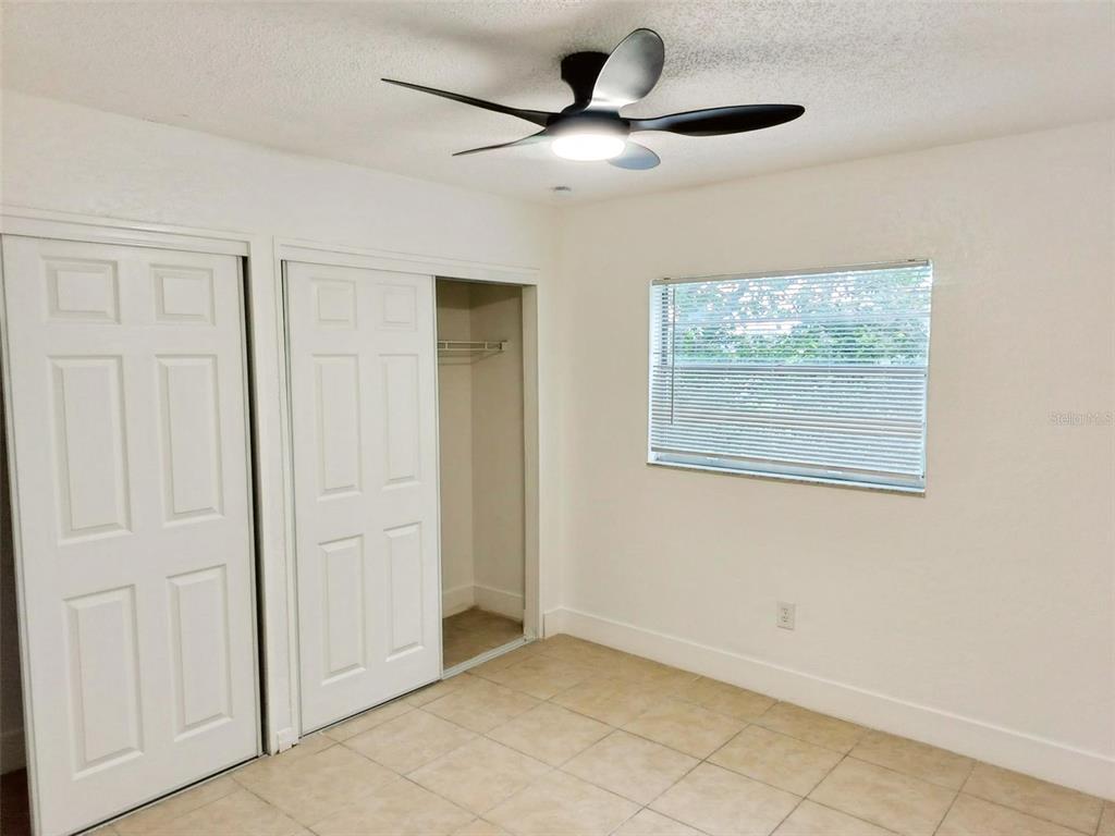 9901 Grace Drive Port Richey, FL 34668 - Photo 9 of 35 a view of an empty room with a window