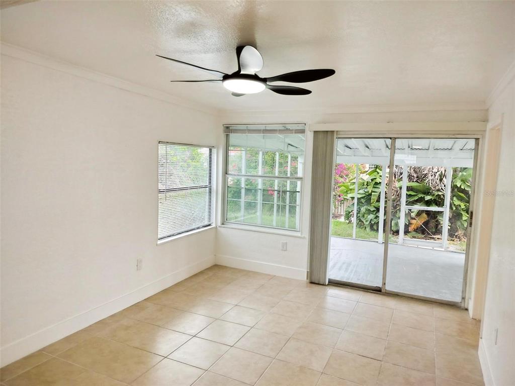 9901 Grace Drive Port Richey, FL 34668 - Photo 10 of 35 a view of an empty room with a window