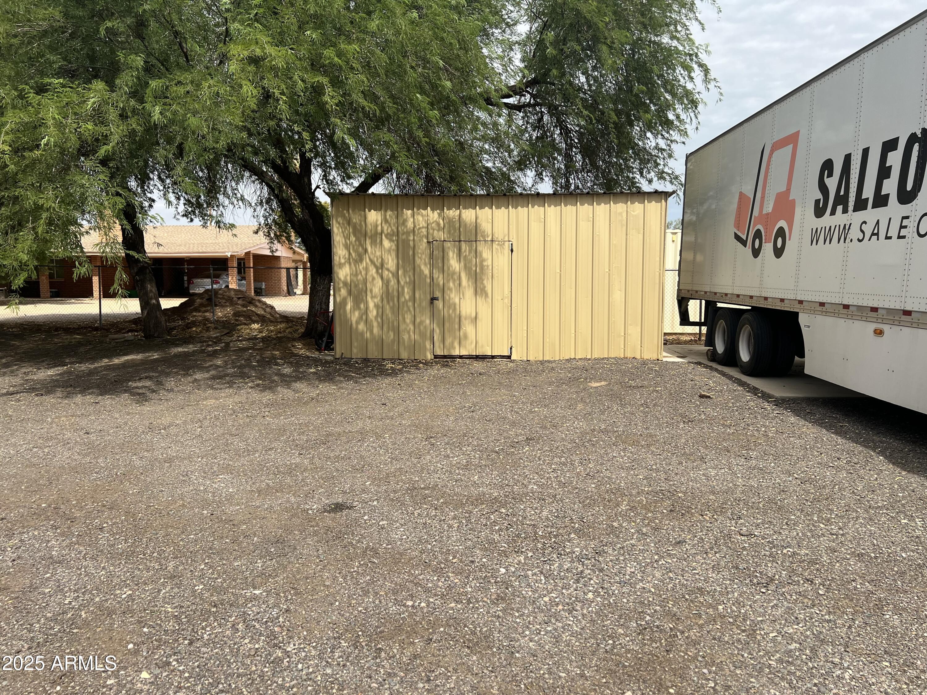 7621 North Alsup Road, Unit REAR Litchfield Park, AZ 85340 - Photo 20 of 26 a view of a house with a yard