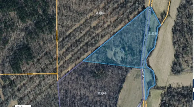 a view of a yard from a balcony