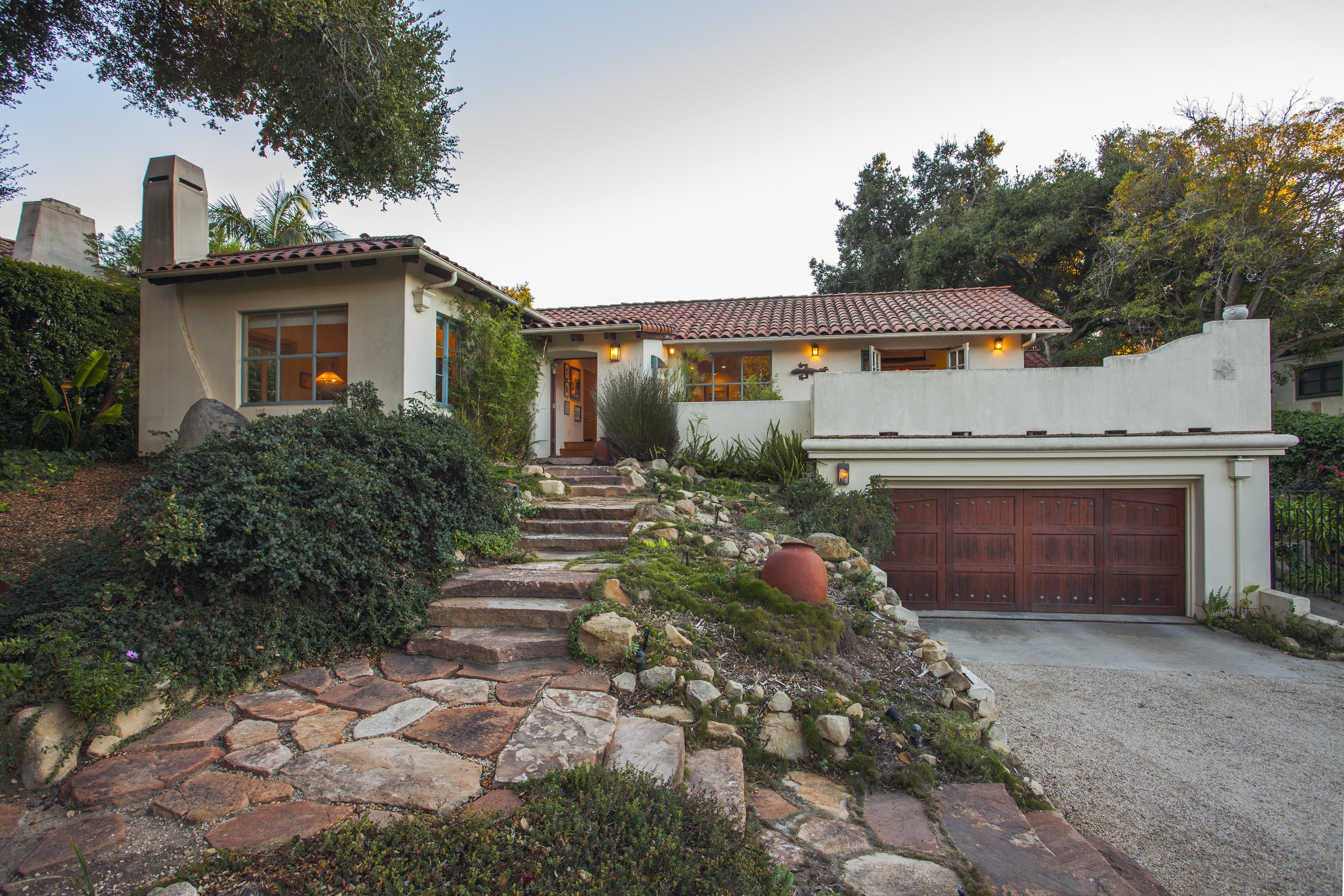 2141 Mission Ridge Road Santa Barbara, CA 93103 - Photo 1 of 18 a front view of a house with garden
