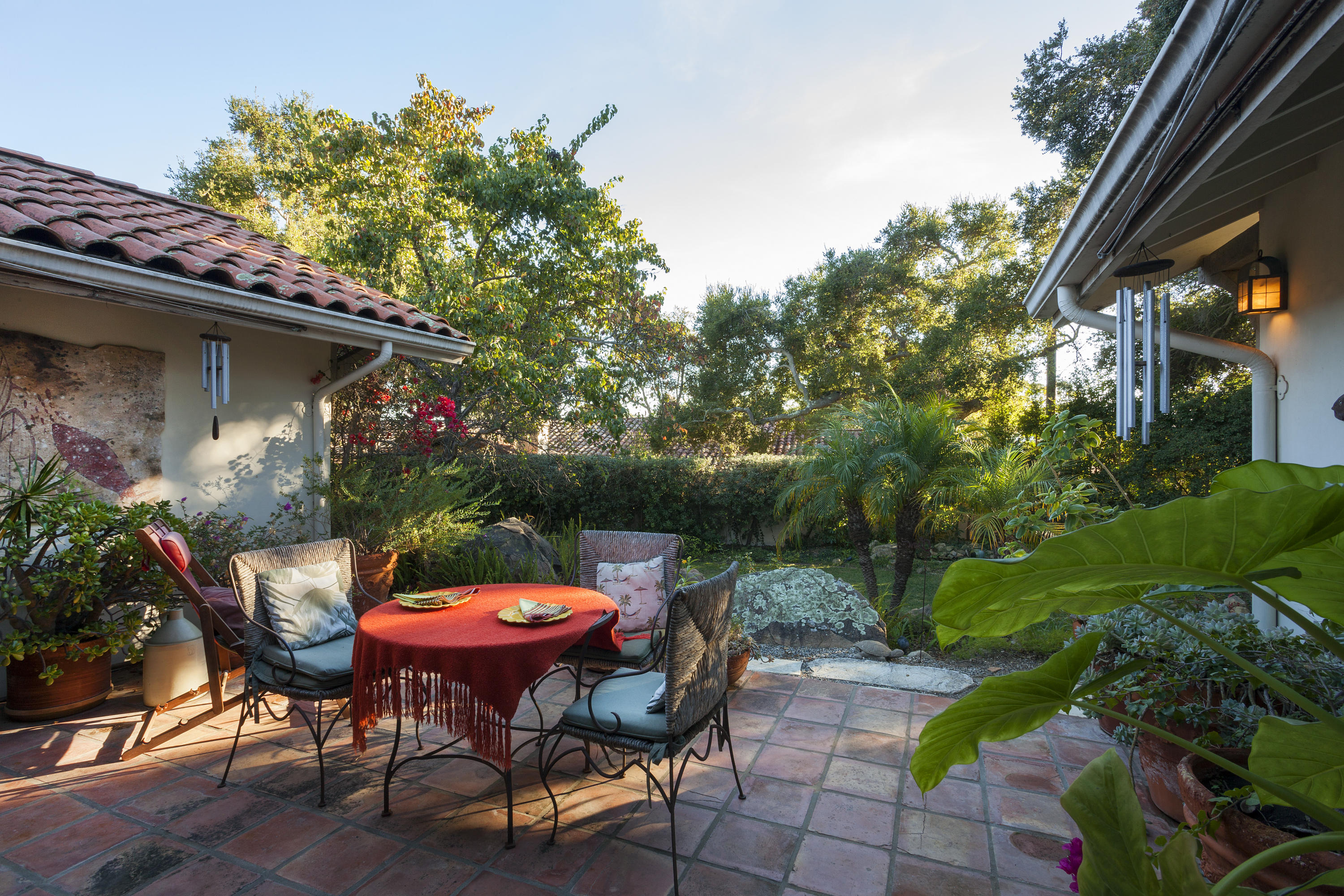 2141 Mission Ridge Road Santa Barbara, CA 93103 - Photo 15 of 18 a wooden bench sitting in backside of a house