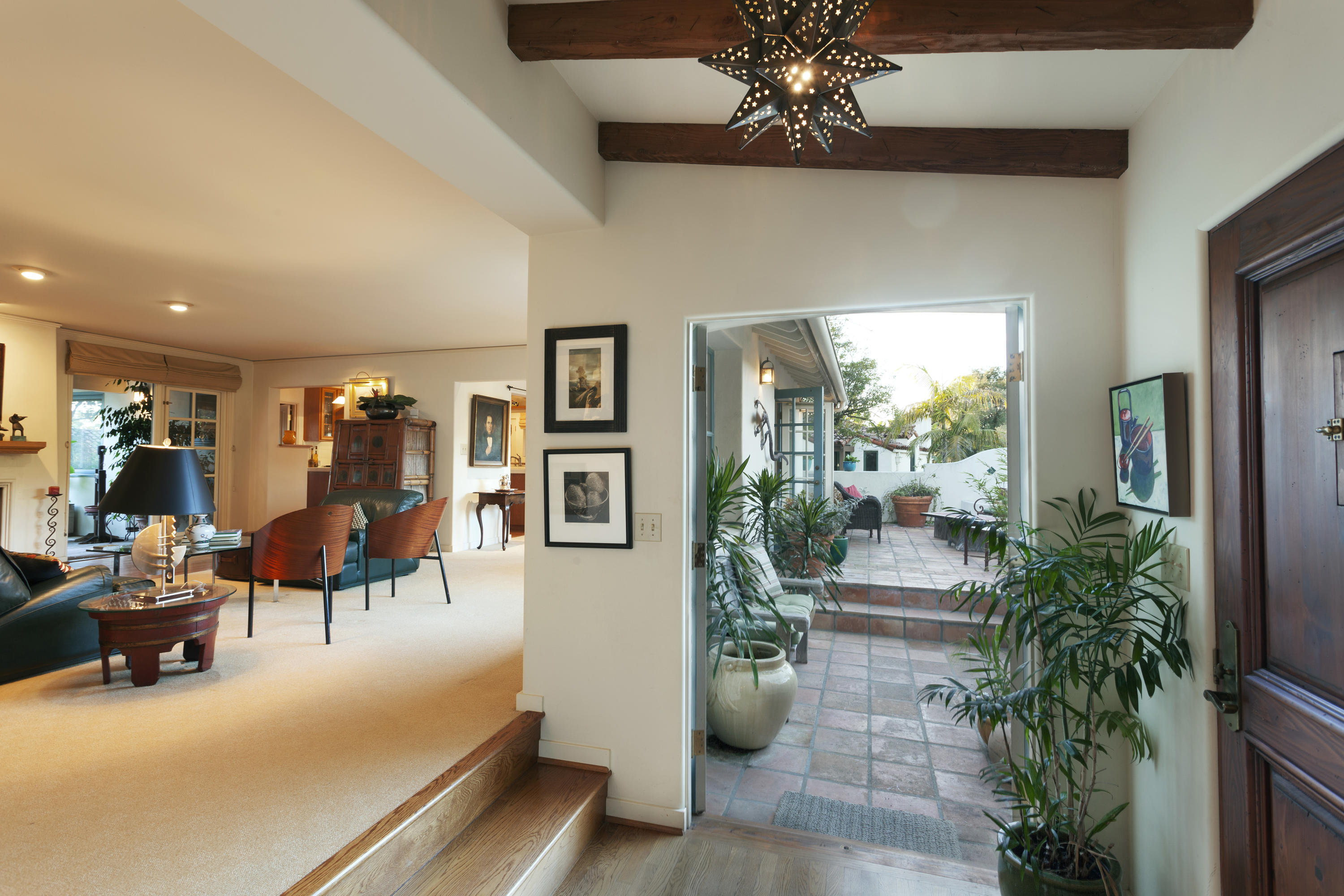 2141 Mission Ridge Road Santa Barbara, CA 93103 - Photo 2 of 18 a living room with furniture and a potted plant
