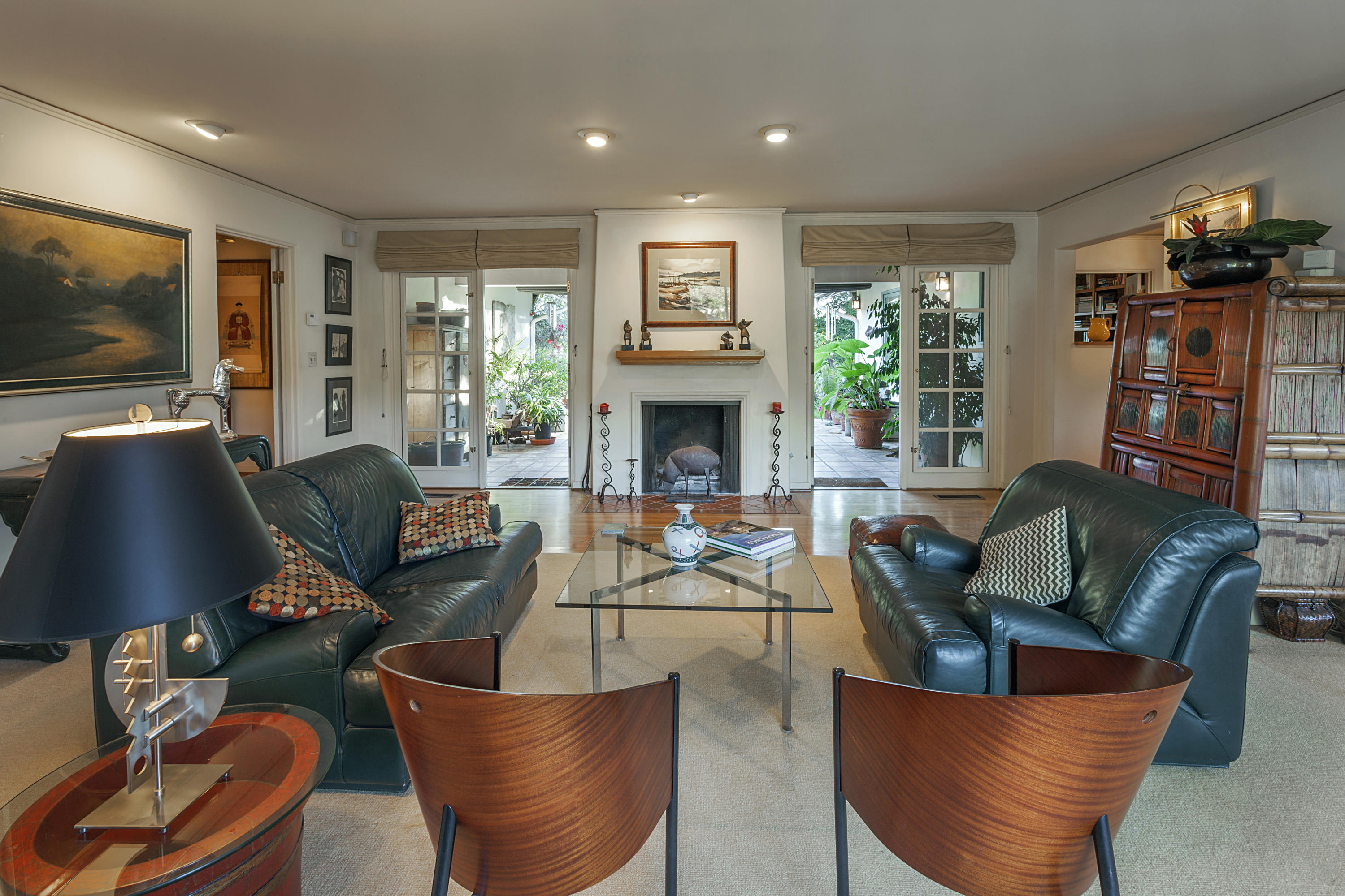 2141 Mission Ridge Road Santa Barbara, CA 93103 - Photo 3 of 18 a living room with fireplace furniture and a flat screen tv