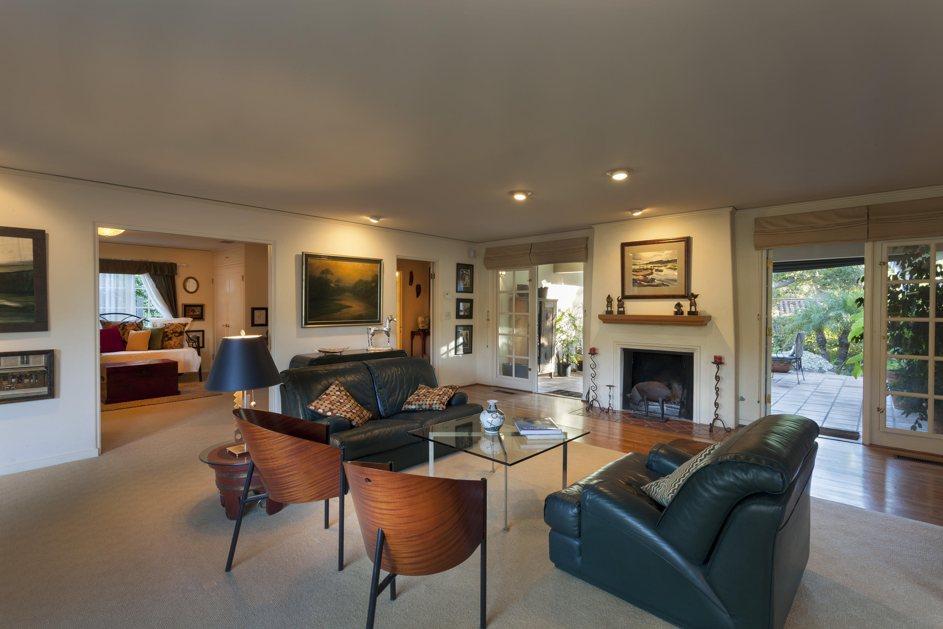 2141 Mission Ridge Road Santa Barbara, CA 93103 - Photo 5 of 18 a living room with furniture a fireplace and a flat screen tv