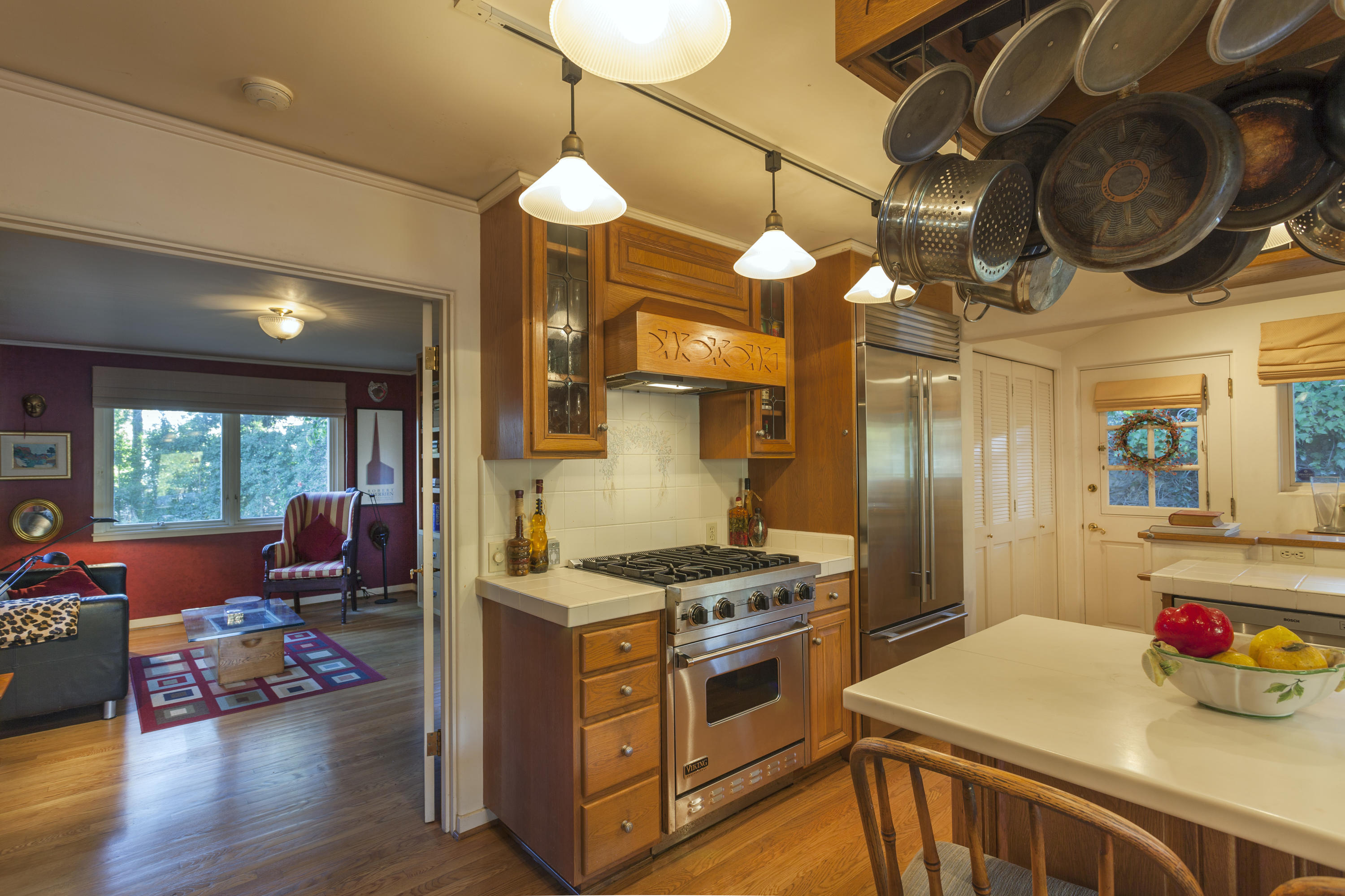 2141 Mission Ridge Road Santa Barbara, CA 93103 - Photo 8 of 18 a kitchen that has a stove and a wooden floor