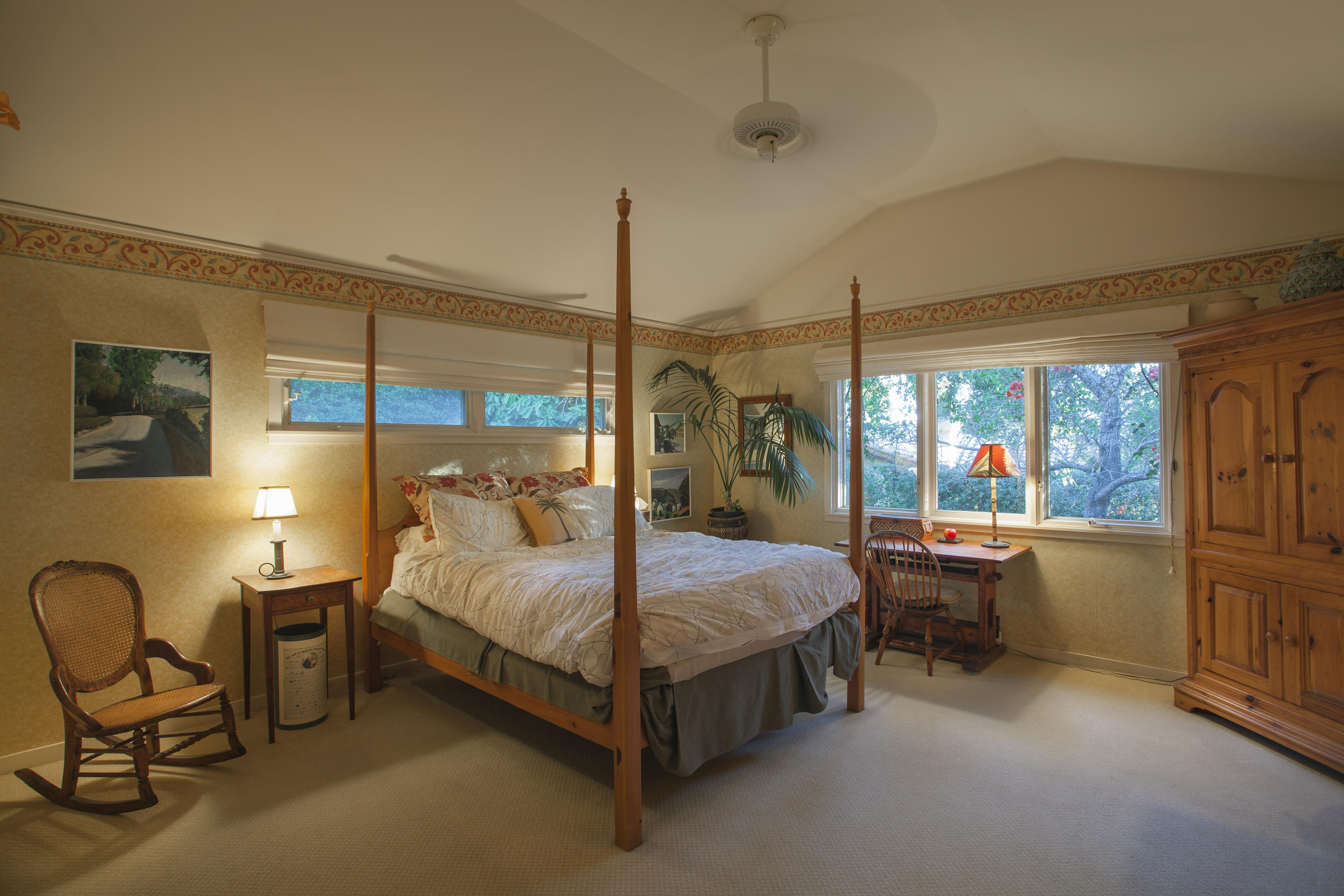 2141 Mission Ridge Road Santa Barbara, CA 93103 - Photo 10 of 18 a bed room with a bed and a chair