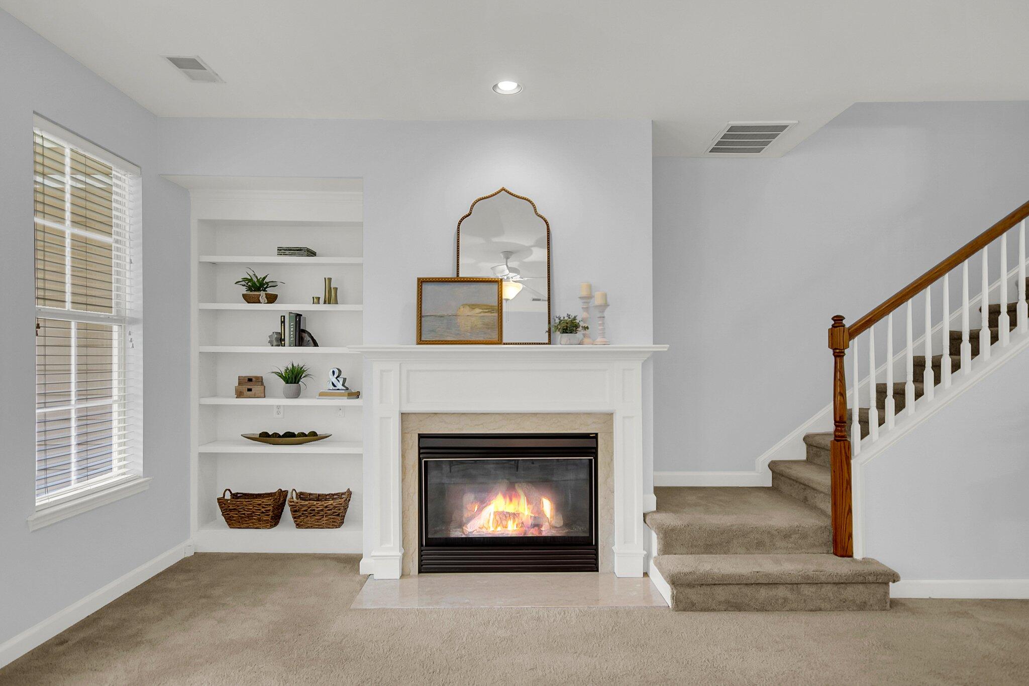 176 Fair Sailing Road Mount Pleasant, SC 29466 - Photo 28 of 56 Gas fireplace with built in bookcase