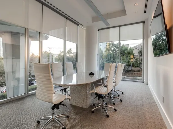 a living room with fireplace furniture and a flat screen tv