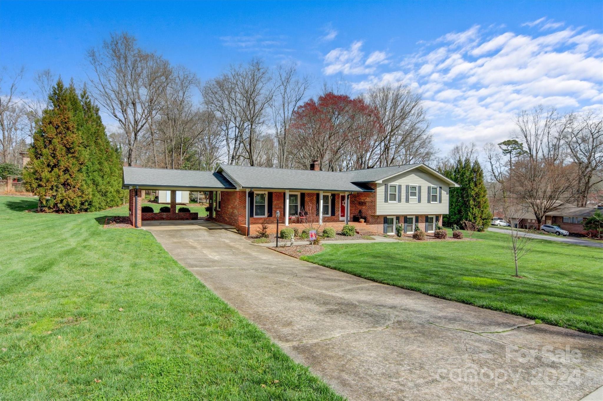 215 6th Street Northeast Conover, NC 28613 - Photo 2 of 47 a front view of a house with yard and green space