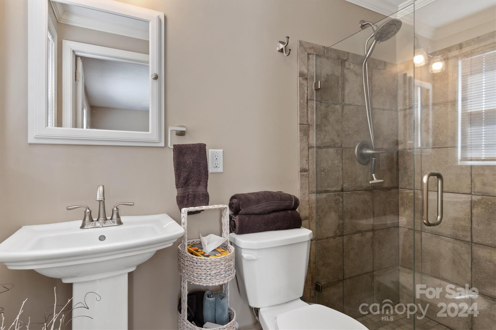 215 6th Street Northeast Conover, NC 28613 - Photo 23 of 47 a bathroom with a sink toilet and shower
