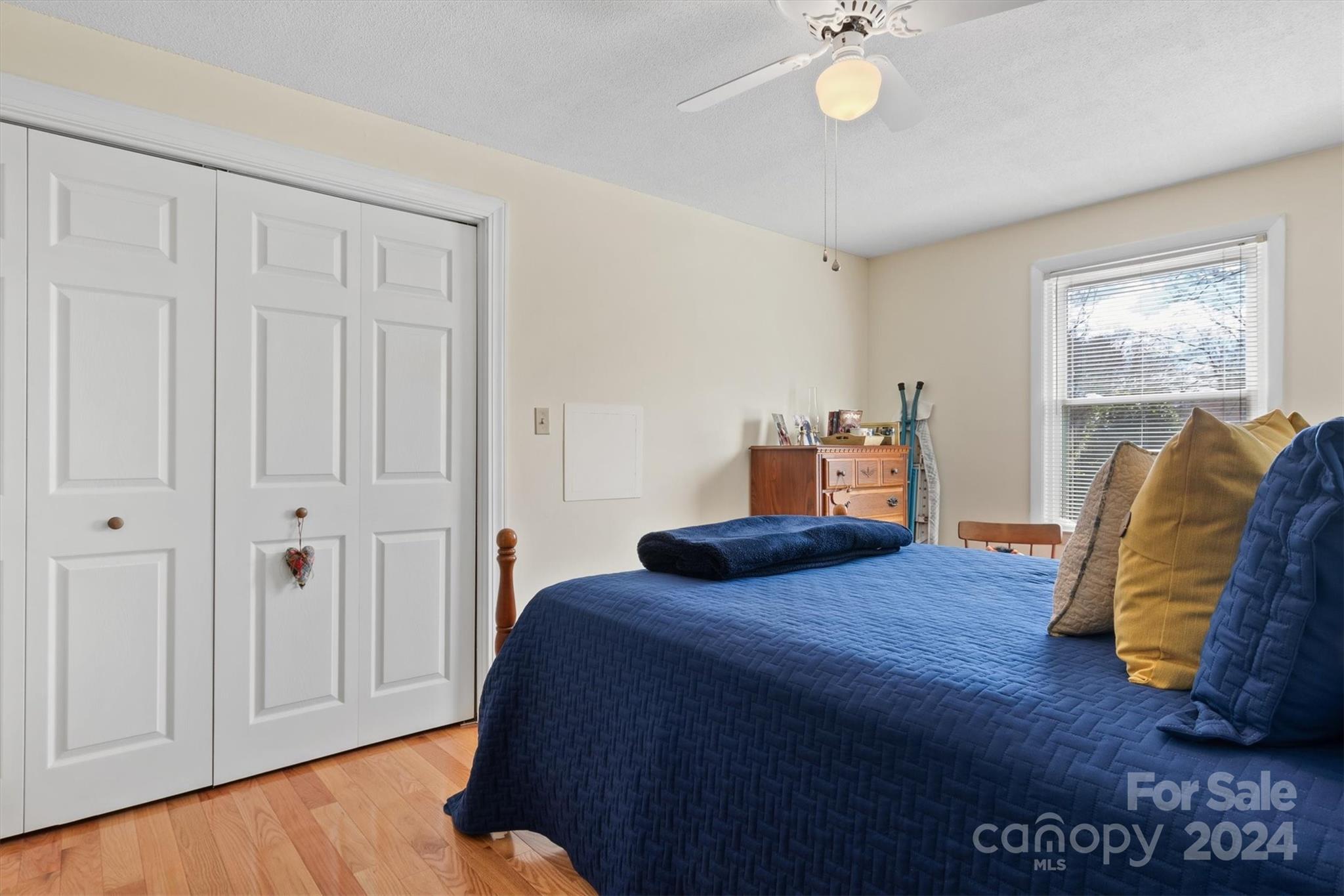 215 6th Street Northeast Conover, NC 28613 - Photo 28 of 47 a bedroom with a bed and cabinets