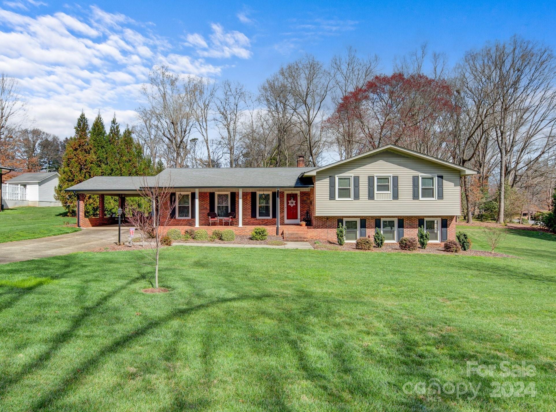 215 6th Street Northeast Conover, NC 28613 - Photo 3 of 47 a view of house with yard and entertaining space