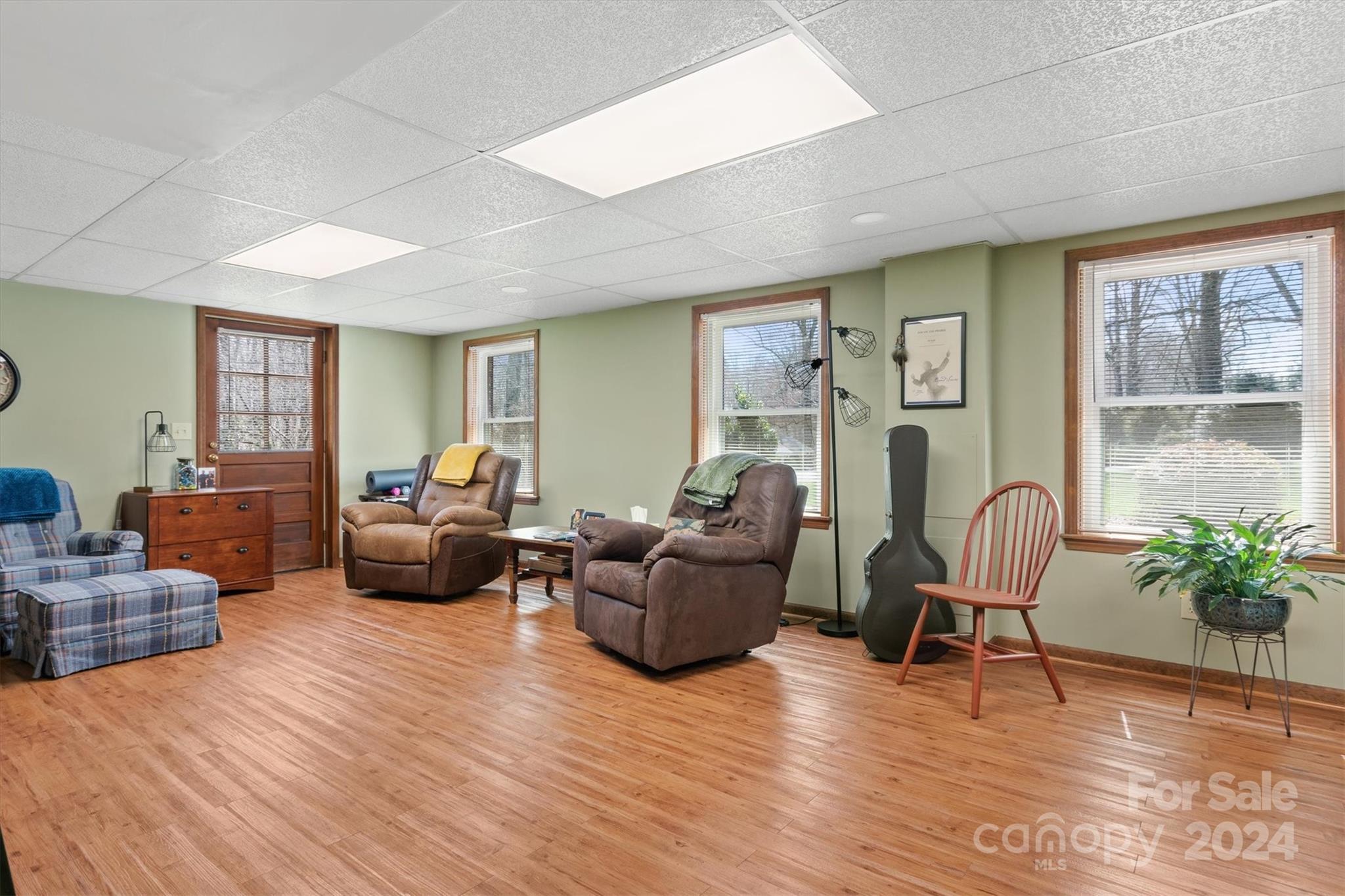 215 6th Street Northeast Conover, NC 28613 - Photo 31 of 47 a living room with furniture and a wooden floor