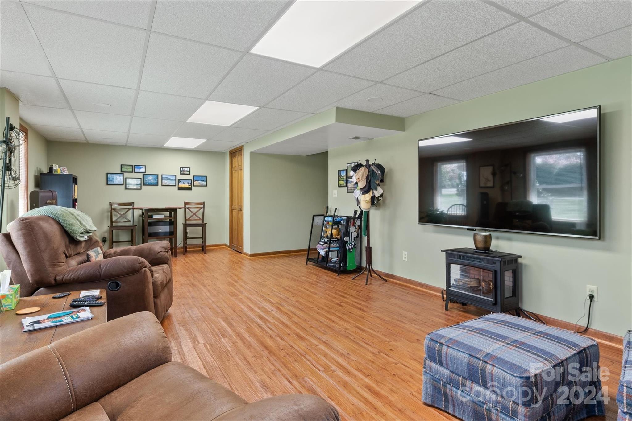 215 6th Street Northeast Conover, NC 28613 - Photo 32 of 47 a living room with furniture and a flat screen tv
