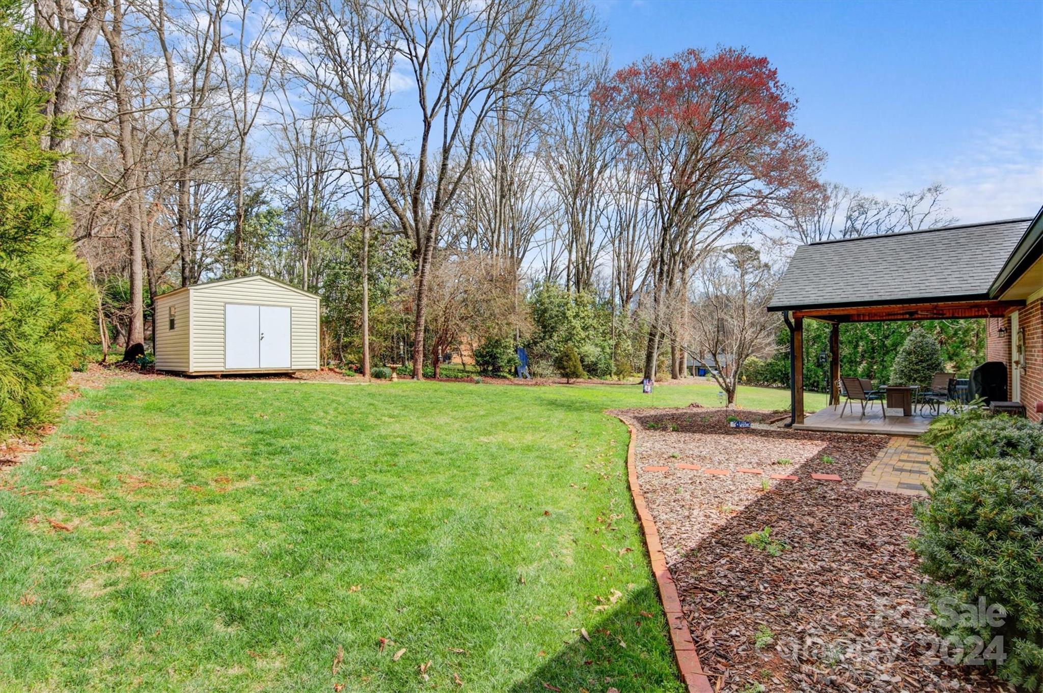 215 6th Street Northeast Conover, NC 28613 - Photo 40 of 47 a front view of a house with garden