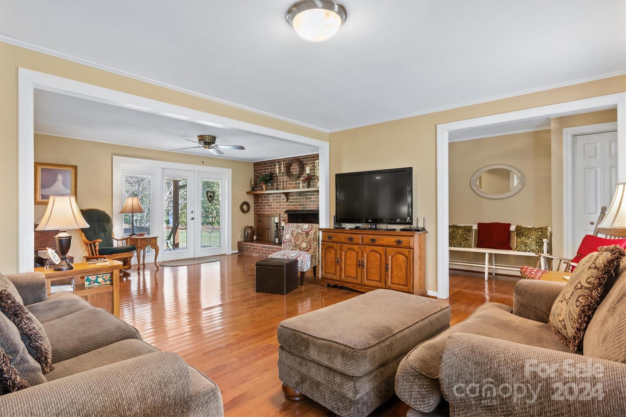 215 6th Street Northeast Conover, NC 28613 - Photo 6 of 47 a living room with furniture and a flat screen tv